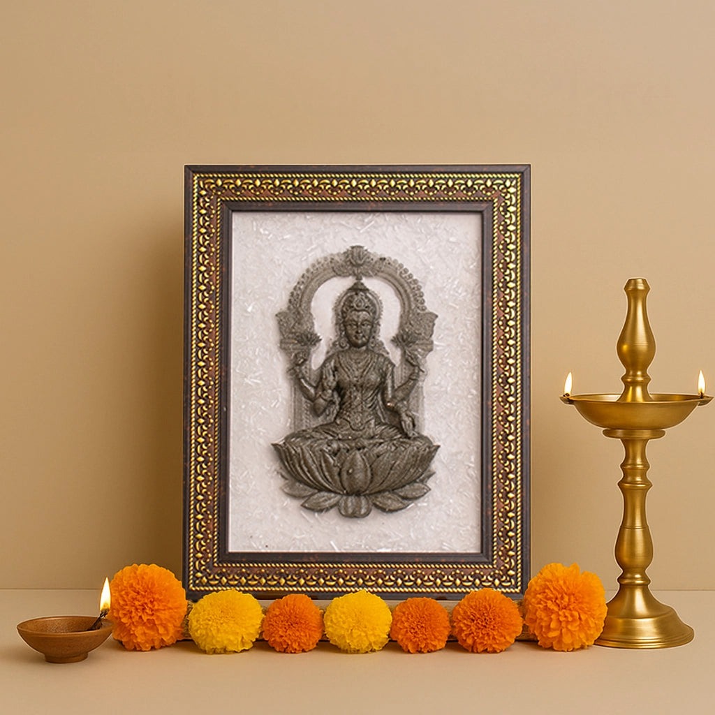 Decorative frame with a seated figure, surrounded by colorful pom-poms and a candlestick on a beige background